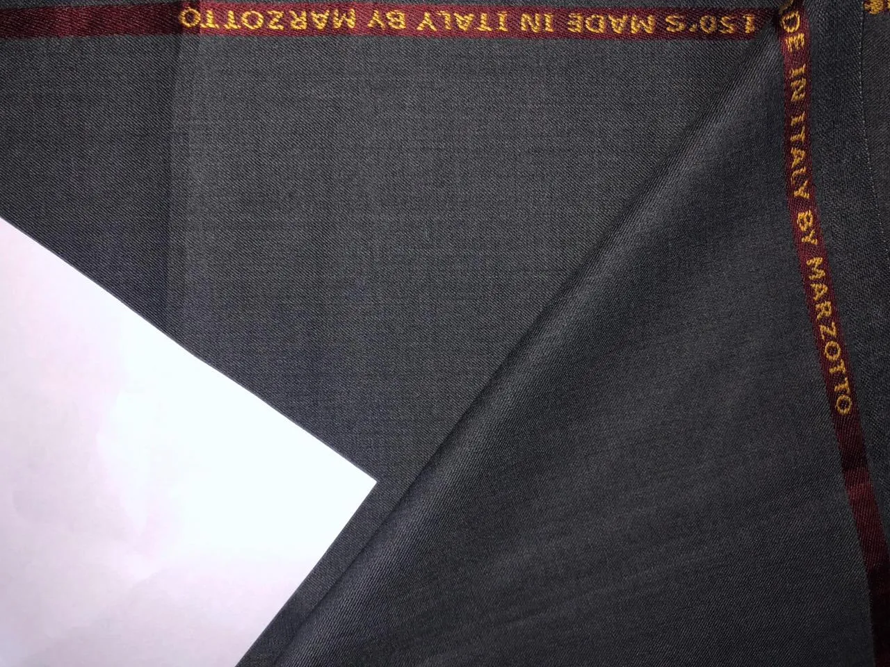 Suiting Superfine blended 70% poly 30% wool  58" wide  available in 5 colors silver grey, grey, navy, denim blue,ink blue